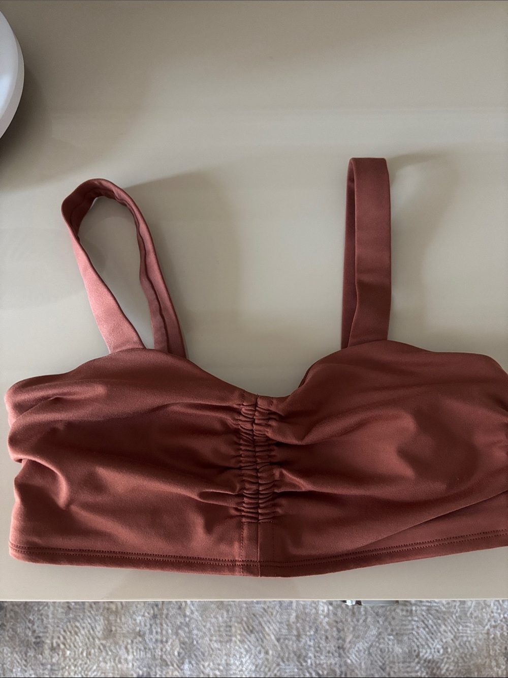 ALO Yoga Ruched Bralette Top in Rust Rose